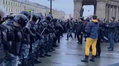 Kids provoking riot police