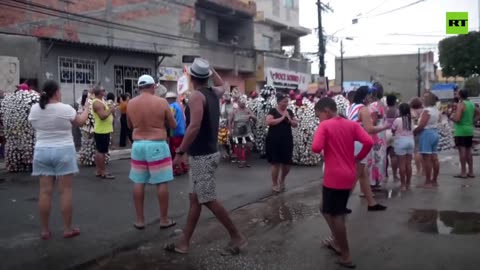 Brazilians carry the can at unusual street party