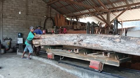 The Process Of Turning Teak Wood Into Blocks Measuring 25X25