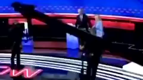 Zoomed in video of Jill Biden leading Joe off the debate stage