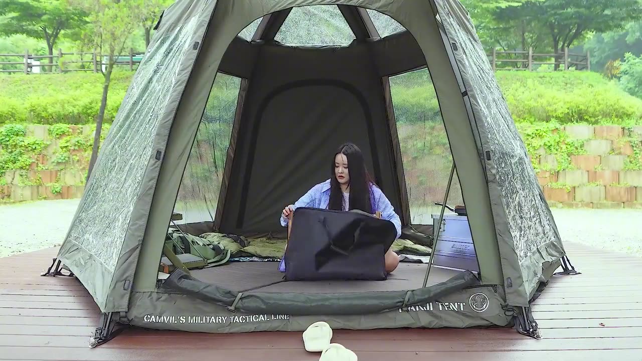 Solo girl camping in rain