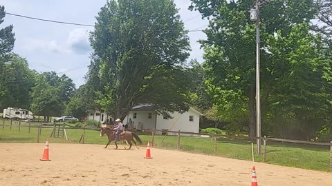 Part Time Cowboy and Cody canter some circles