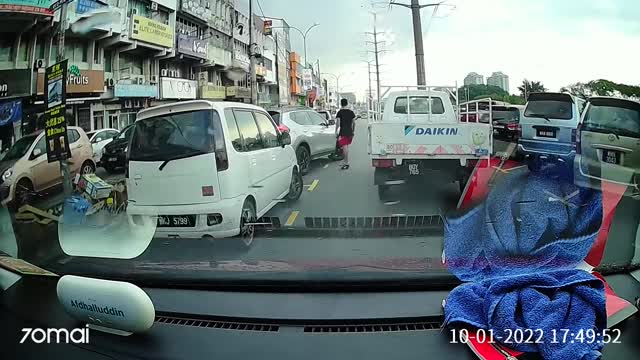 Skitching Skateboarder Wipes Out