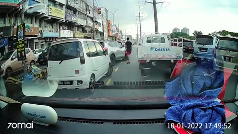 Skitching Skateboarder Wipes Out