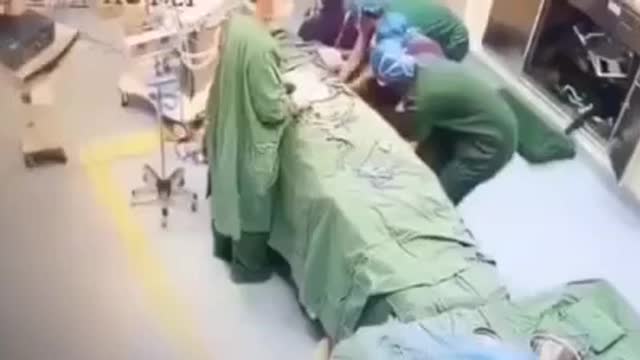 Vaccinated/ Boosted Surgeon Collapses while performing surgery.