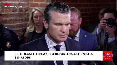 Pete Hegseth, Sec Def nominee, speaks to reporters on Capitol Hill.