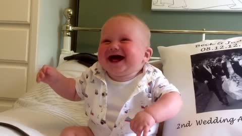 Baby laughing and chuckling