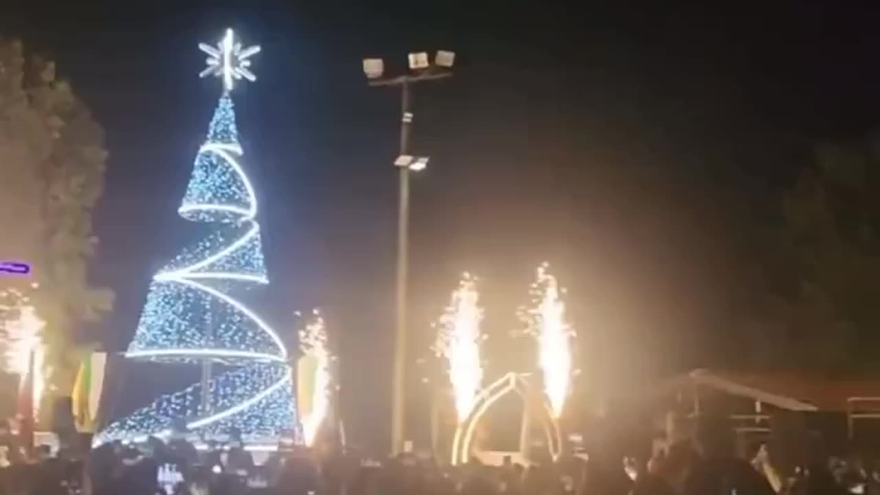 Christmas trees being lit up in Syria. God bless the Christians of Syria!