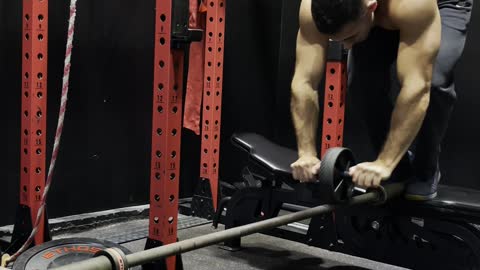 Ab Wheeling on a Barbell