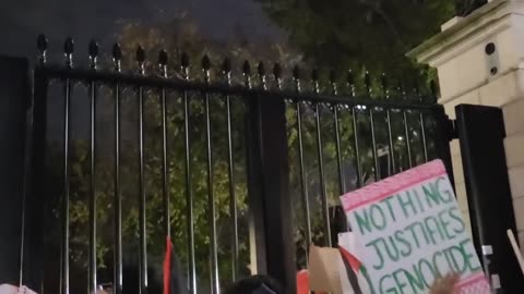 The White House’s NW entrance has been smeared with red paint and protesters are pushing on gate