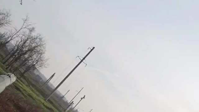 Russian ATGMs overflying near a V.S.U. tank