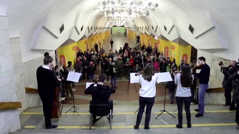 Ukrainian musicians hold concert in metro shelter