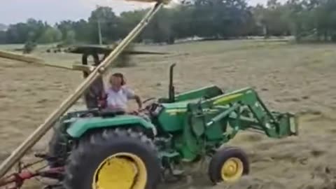 Dad and son baling side by side!