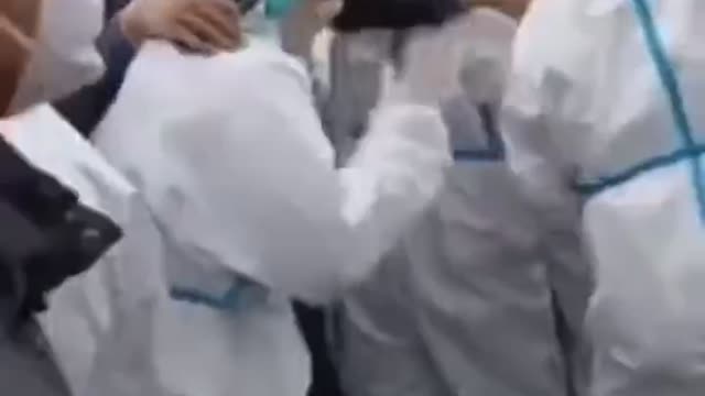 Workers rioting in China.