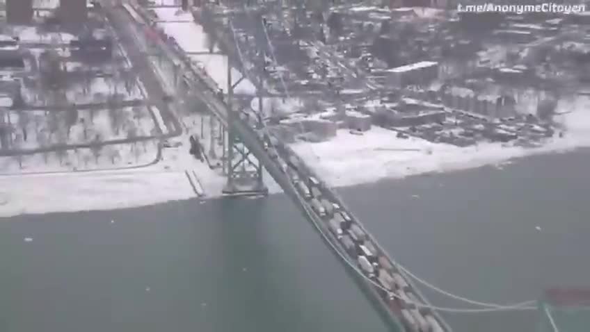 Truckers block the Ambassador Bridge connecting Canada (Windsor) and the United States (Detroit).