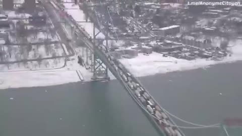 Truckers block the Ambassador Bridge connecting Canada (Windsor) and the United States (Detroit).