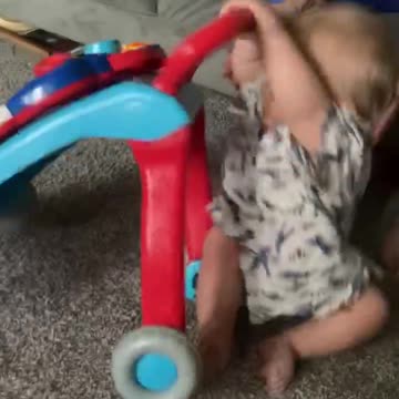 David walking with his toy