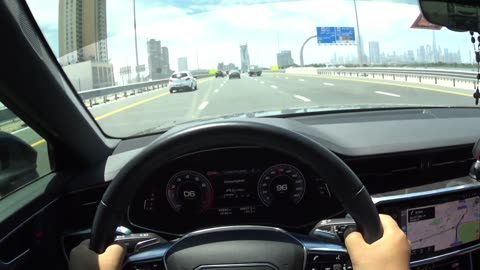 Rainy Day Ride: Exploring Dubai's Charm Amidst Drizzles from the Comfort of Your Car