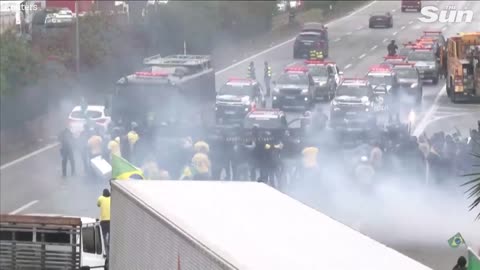 Brazilian police fire water cannons and rubber bullets at anti Lula protesters