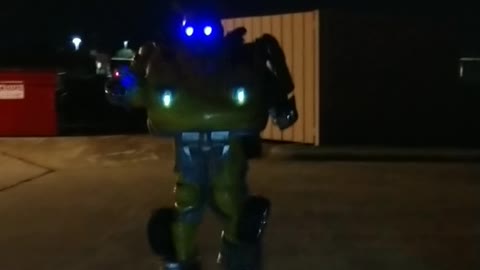 Walk in the dark with a yellow robot superhero mascot bumblebee at bouncing bears spring Texas