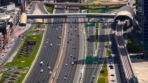 Lost in the rhythm of Dubai’s highways, surrounded by towers that reach for the stars.