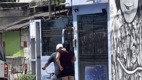 Cute Couple Ride A Bike Together In Tulum Mexico