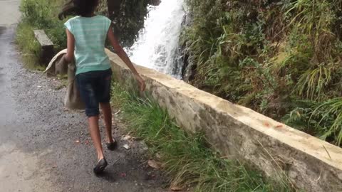 Kids Enjoying Mini Waterfall In Srilanka