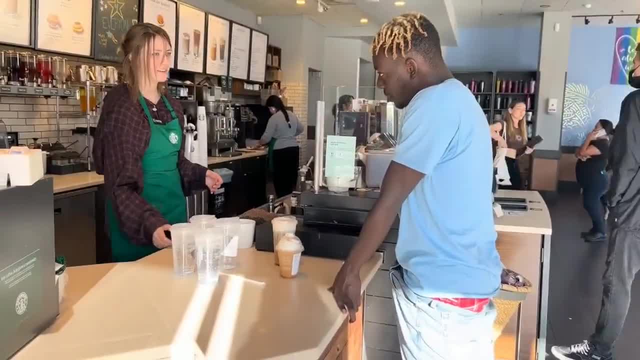 Black sicko playing with himself in Starbucks line