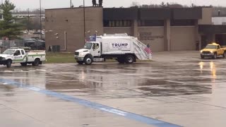 MAGA Garbage Truck Greets Trump At Wisconsin Airport