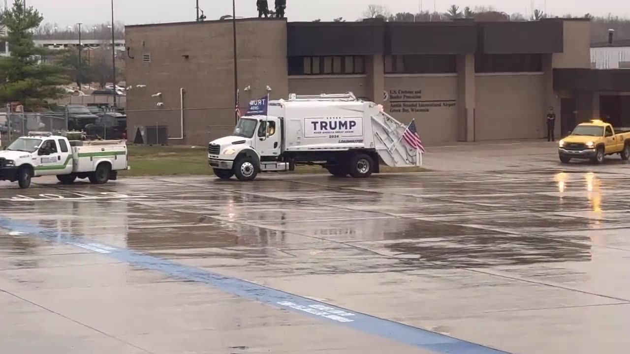 MAGA Garbage Truck Greets Trump At Wisconsin Airport