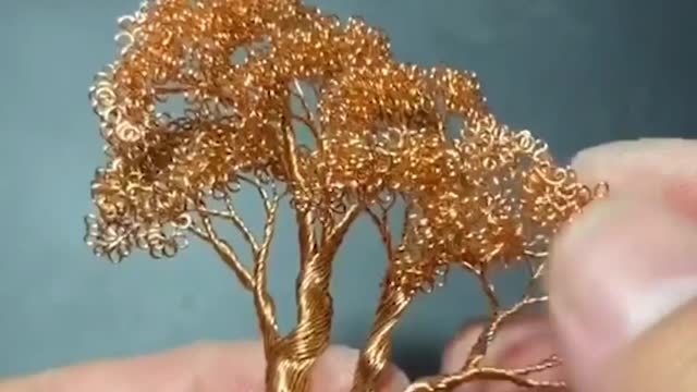 He makes a tree from old electrical wires