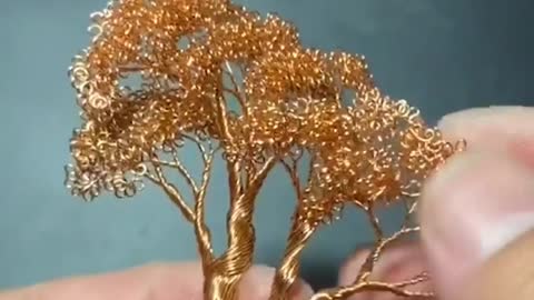 He makes a tree from old electrical wires