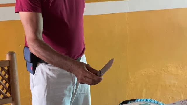 Grandfather Deems Kitchen Knife too Small to Cut Cake