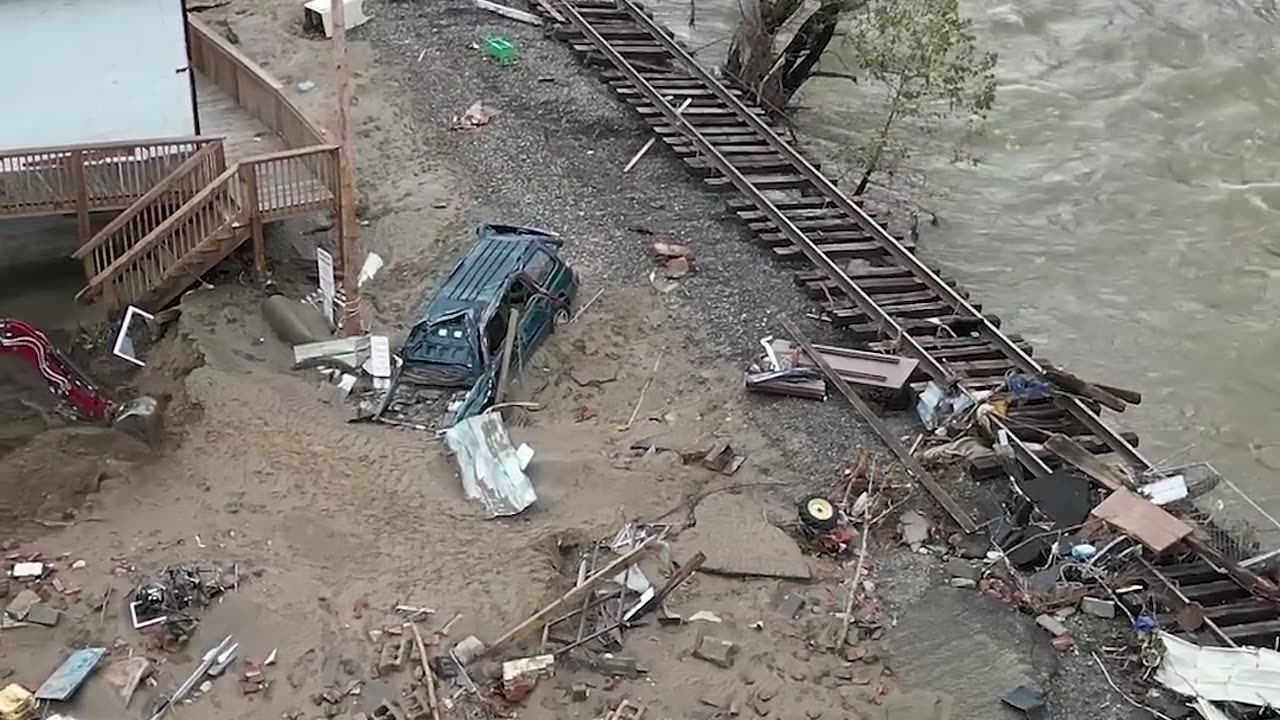 Before & After_ Town Underwater, Cars Crushed