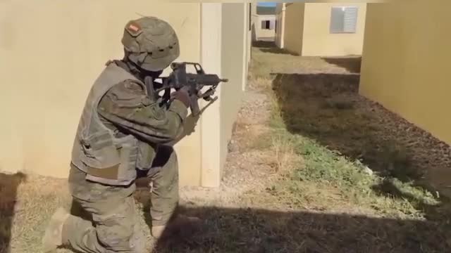 Catalonia" (motorized) Battalions training in combat in the town with the support of Leopardos