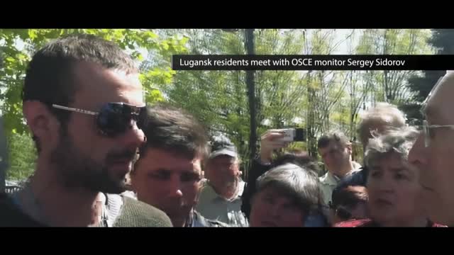 Residents in Lugansk meeting with OSCE monitor