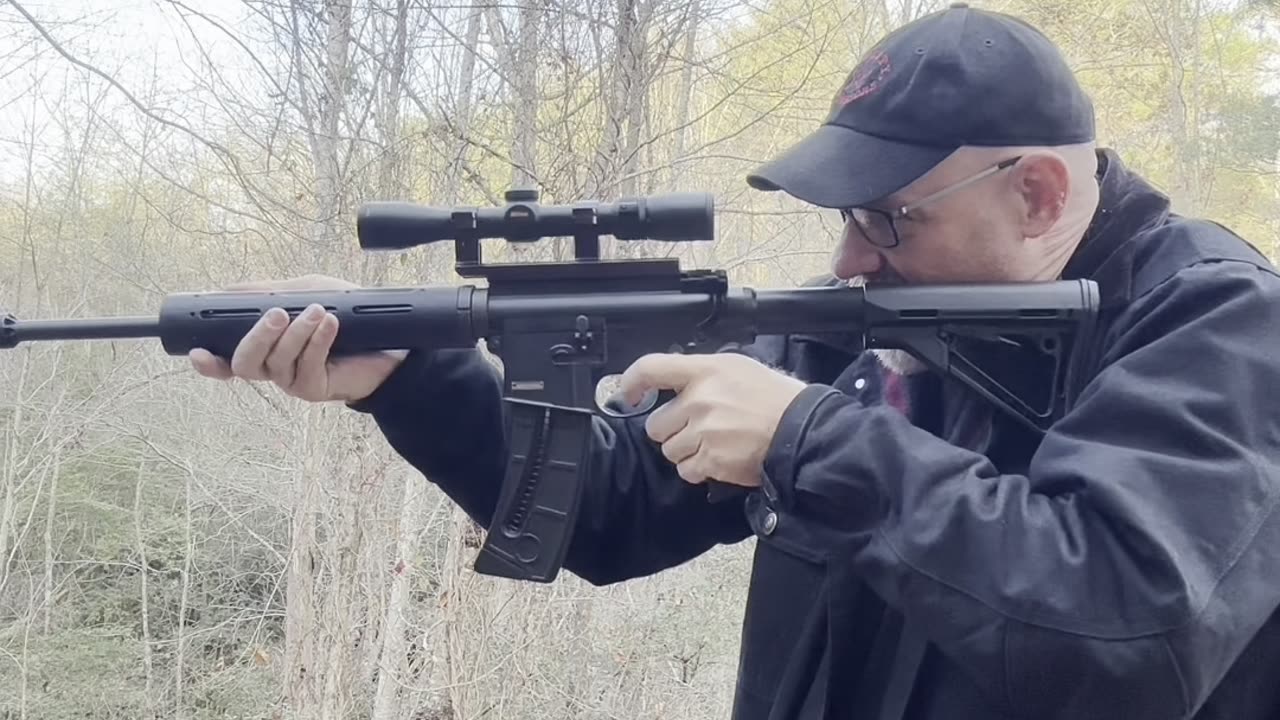 Vector rimfire suppressor on a rimfire rifle