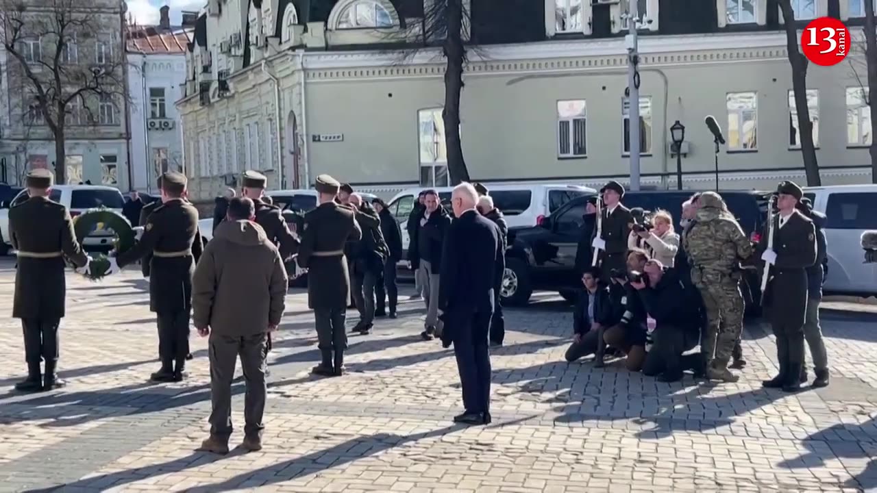 U.S. Biden and Ukraine's Zelenskiy commemorate killed soldiers as air raid siren wails