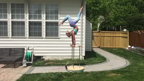 Girl Uses Feet to Do Archery