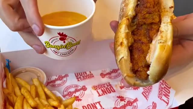 Food porn at its finest! Cheesy hot chicken sandwich from