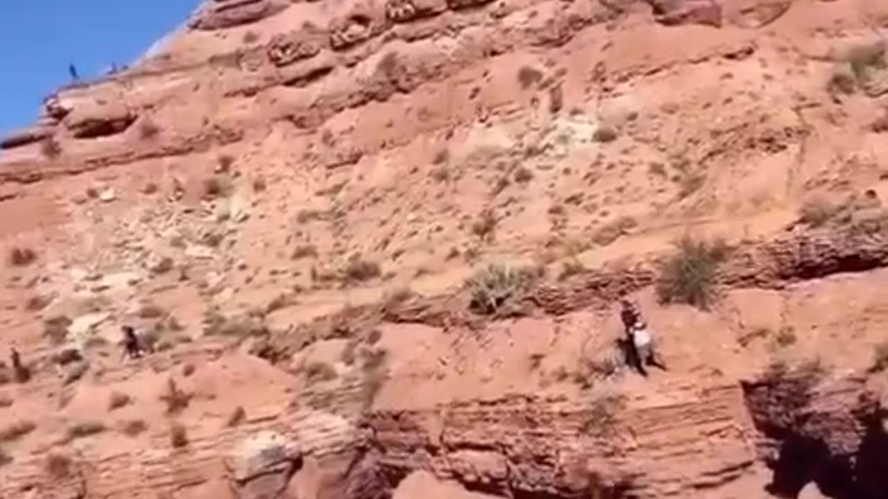 Cycling stunt on mountain