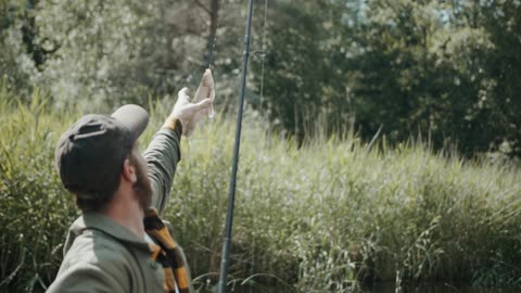 man fishing in the forest small poll