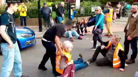 Motorists drag Just Stop Oil protesters off central London road