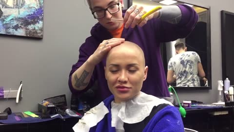 Girl headshave from razor