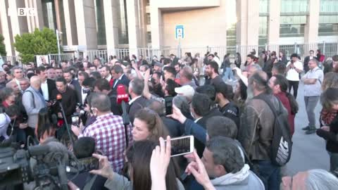 Turkish activist Osman Kavala sentenced to life in prison - BBC News