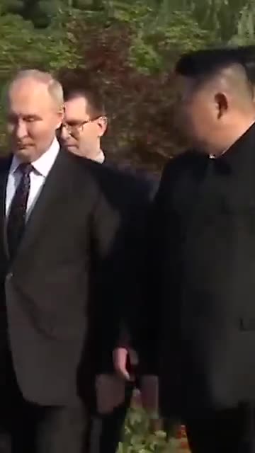 Putin and Kim take turns driving a Russian-made limo