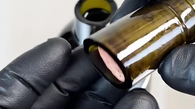 Pop Open A Bottle Of Wine With Port Tongs