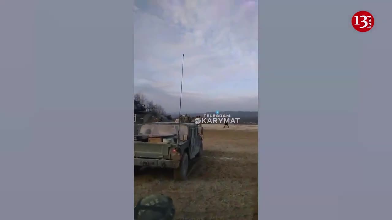 Ukrainian troops preparing for battle with Bradley, M113 and Hamvee vehicles
