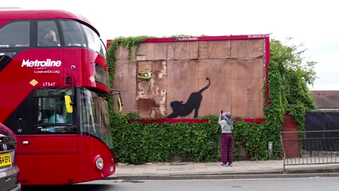 Sixth Banksy artwork in a week appears on an old billboard