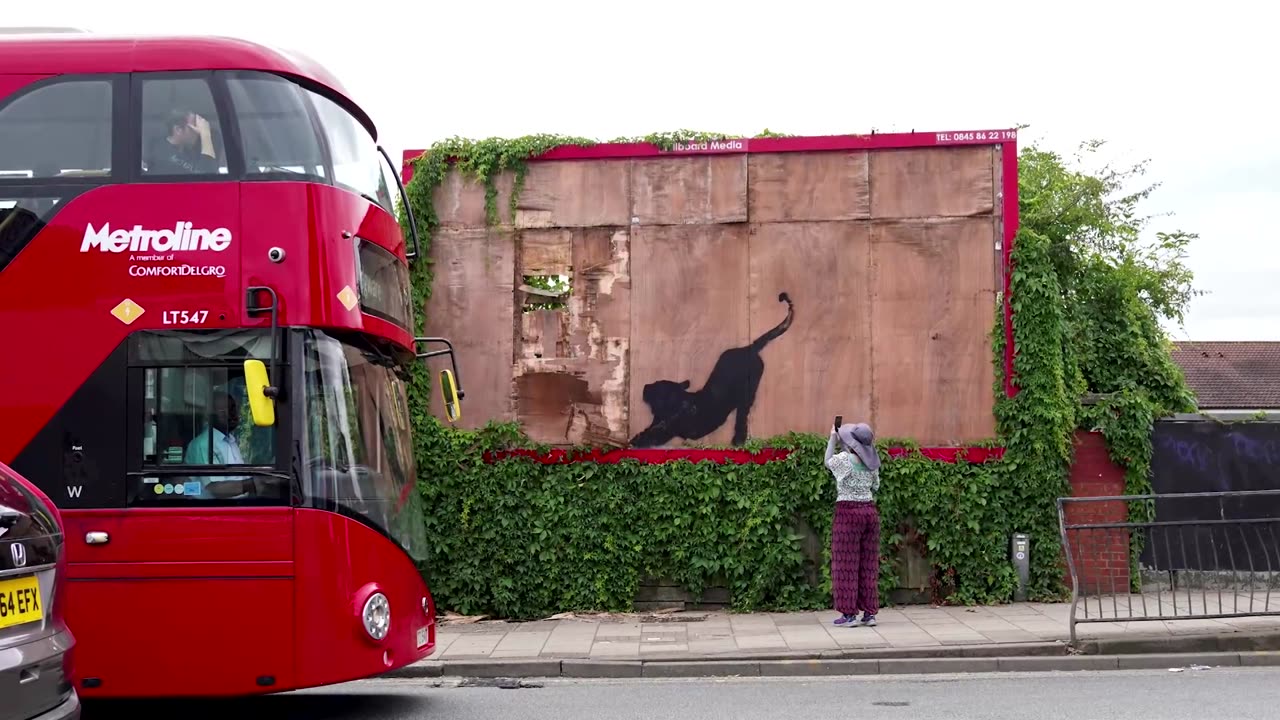 Sixth Banksy artwork in a week appears on an old billboard